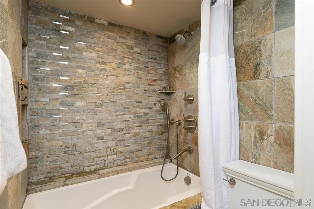 323 Shoemaker Lane Solana Beach, CA 92075 - Photo 13 of 25 a bathroom with a shower