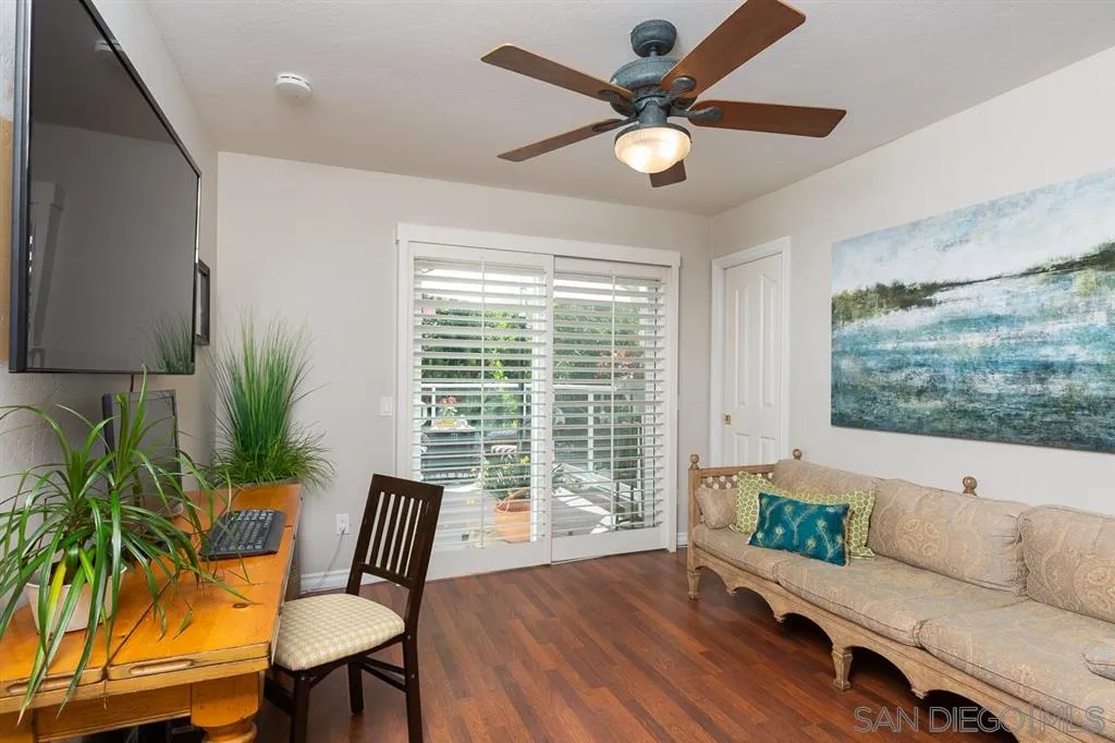 323 Shoemaker Lane Solana Beach, CA 92075 - Photo 19 of 25 a living room with furniture and a large window
