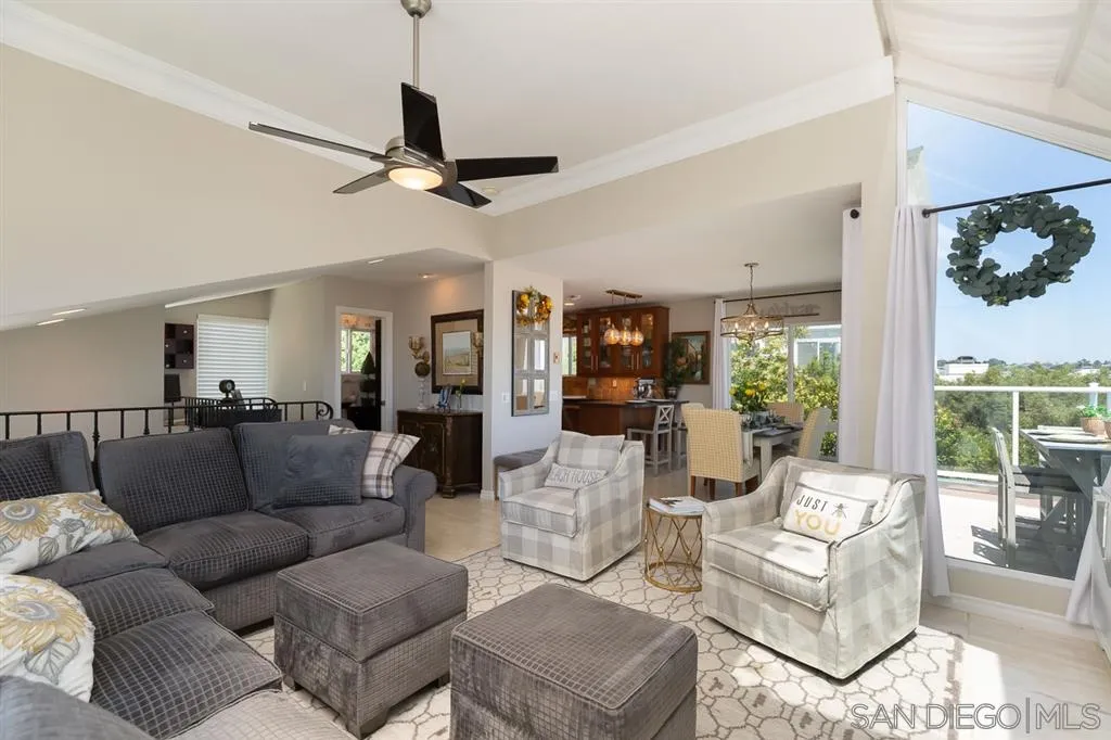323 Shoemaker Lane Solana Beach, CA 92075 - Photo 3 of 25 a living room with furniture a ceiling fan and a window