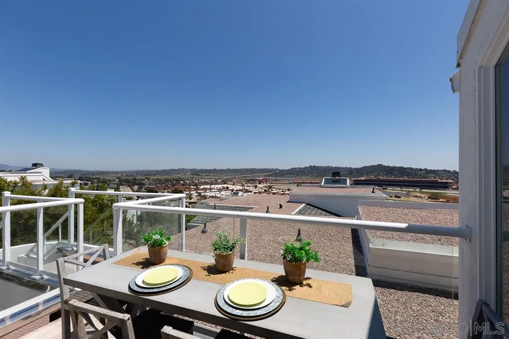 323 Shoemaker Lane Solana Beach, CA 92075 - Photo 7 of 25 a view of a balcony with table and chairs