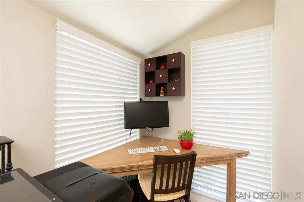 323 Shoemaker Lane Solana Beach, CA 92075 - Photo 9 of 25 a living room with furniture and a flat screen tv