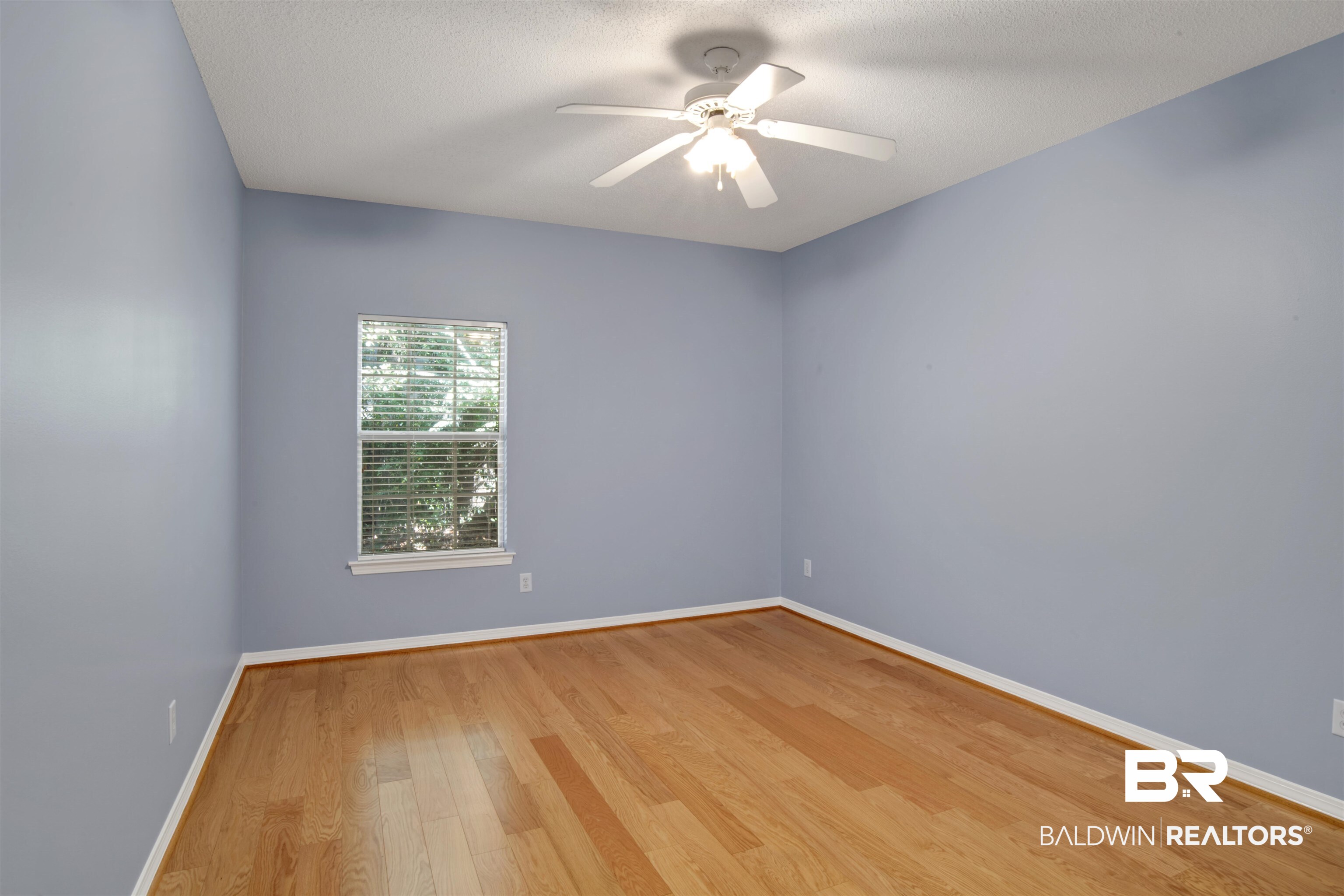 125 Woodruff Court Mobile, AL 36608 - Photo 20 of 27 Bedroom featuring light hardwood / wood-style floors, and ceiling fan