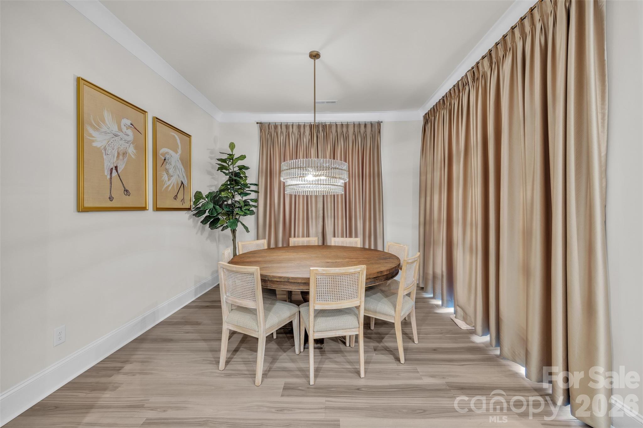 513 Meadow Ridge Drive Belmont, NC 28012 - Photo 12 of 40 a dining room with furniture window and wooden floor