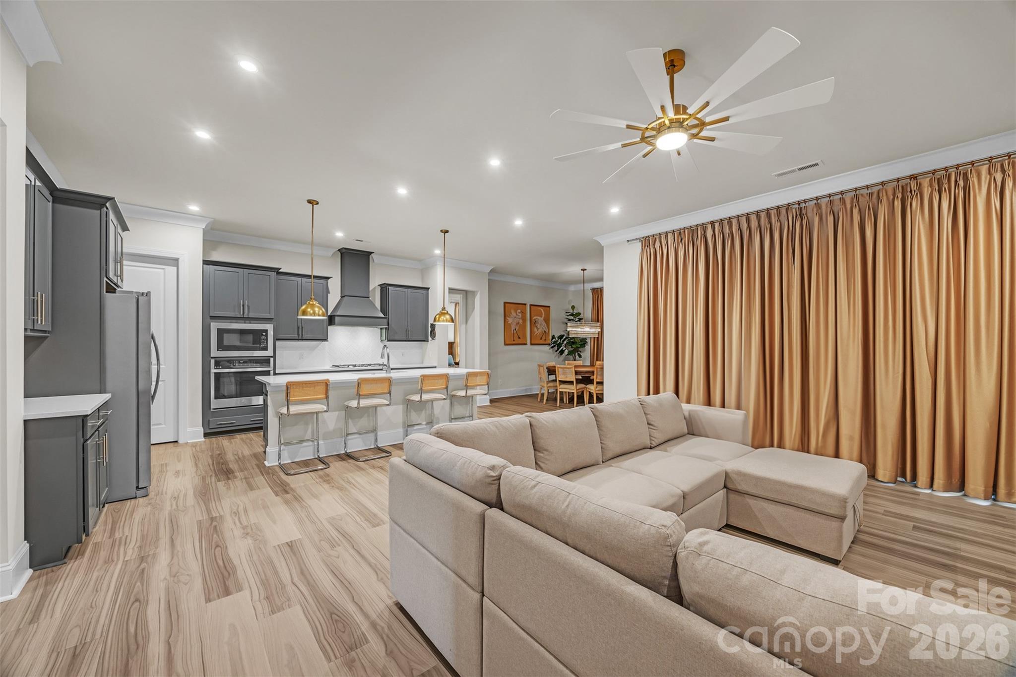 513 Meadow Ridge Drive Belmont, NC 28012 - Photo 15 of 40 a living room with furniture and kitchen view