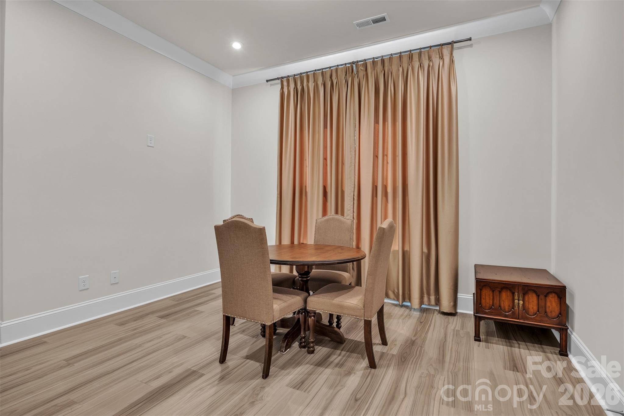 513 Meadow Ridge Drive Belmont, NC 28012 - Photo 18 of 40 a view of a workspace with furniture and a window