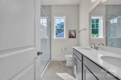 a bathroom with a sink a toilet and a bathtub