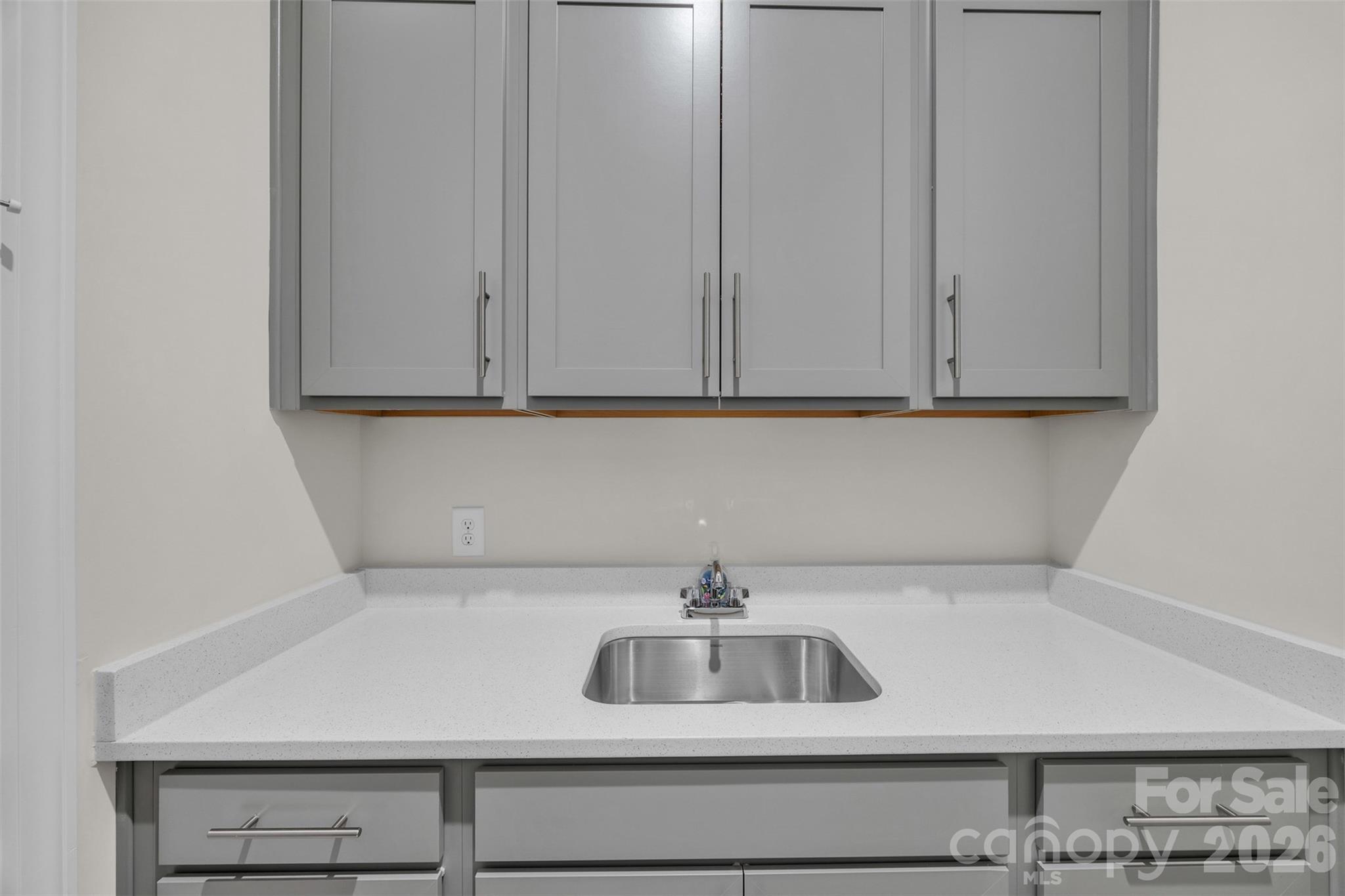 513 Meadow Ridge Drive Belmont, NC 28012 - Photo 25 of 40 a kitchen with a sink and cabinets