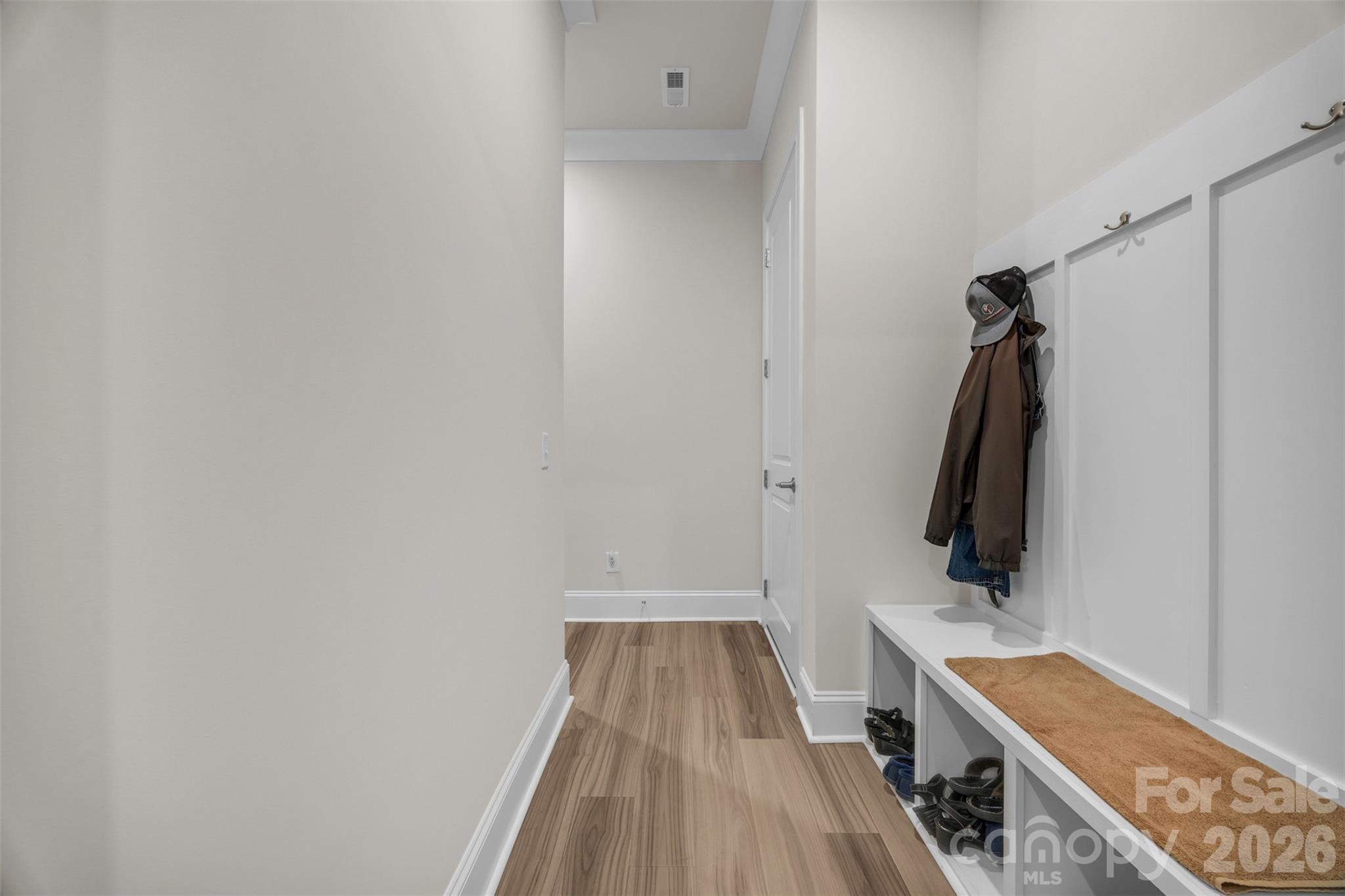 513 Meadow Ridge Drive Belmont, NC 28012 - Photo 32 of 40 a view of a room with wooden floor and cabinet