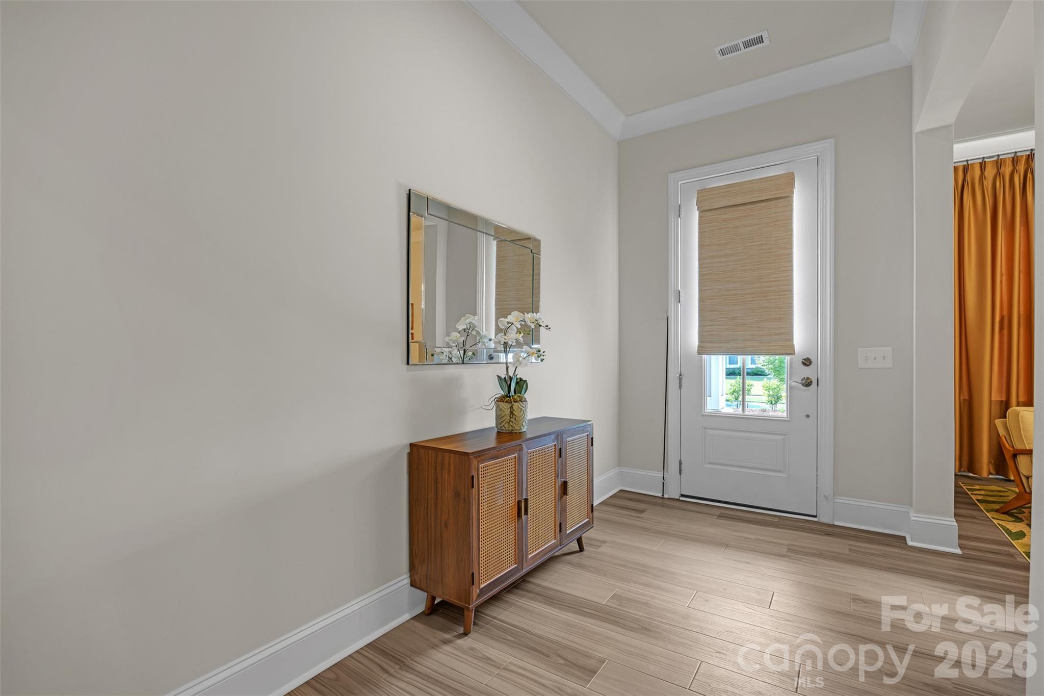 513 Meadow Ridge Drive Belmont, NC 28012 - Photo 33 of 40 a view of a livingroom with wooden floor and windows