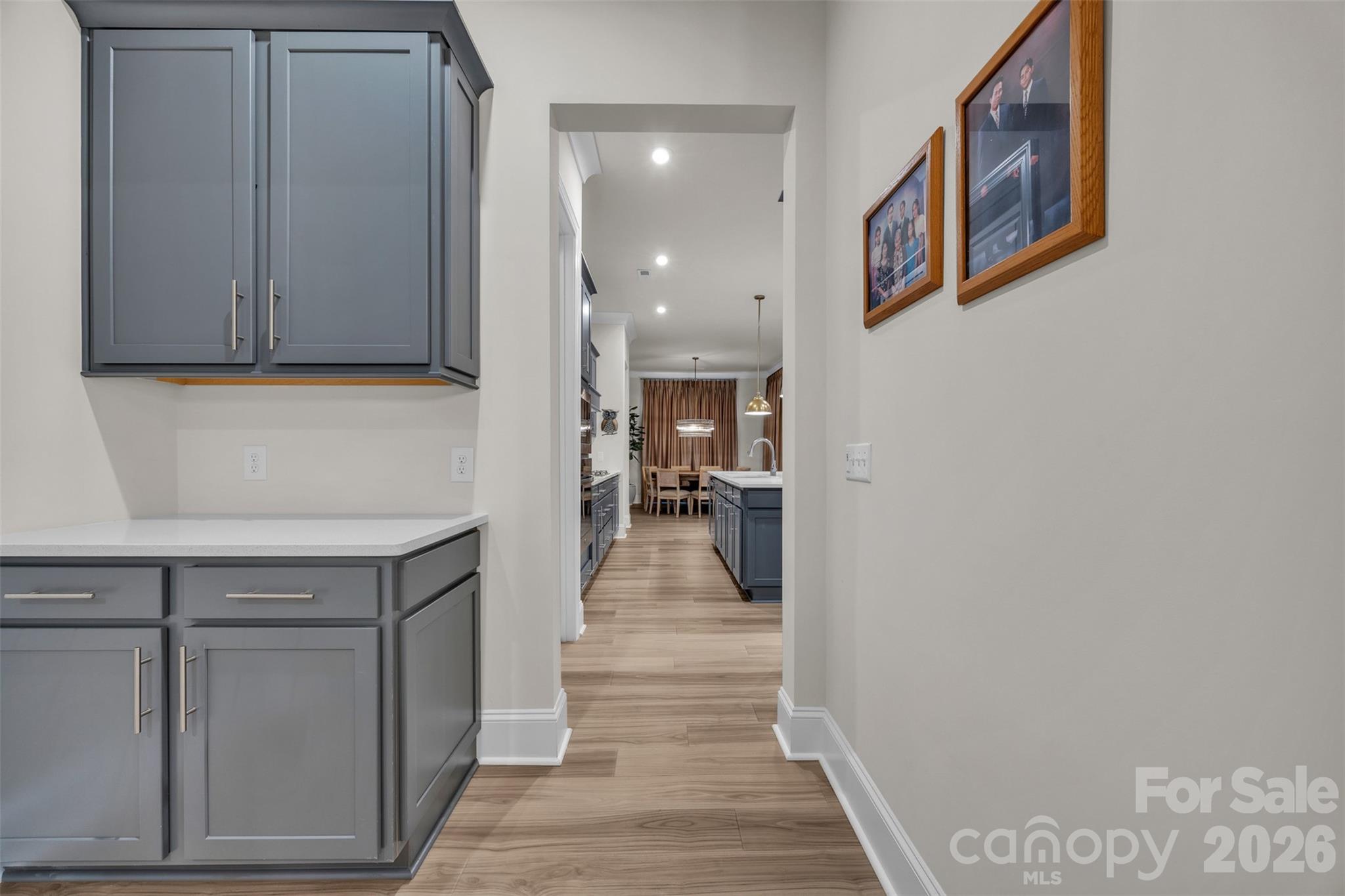 513 Meadow Ridge Drive Belmont, NC 28012 - Photo 35 of 40 a view of a hallway with wooden floor and staircase