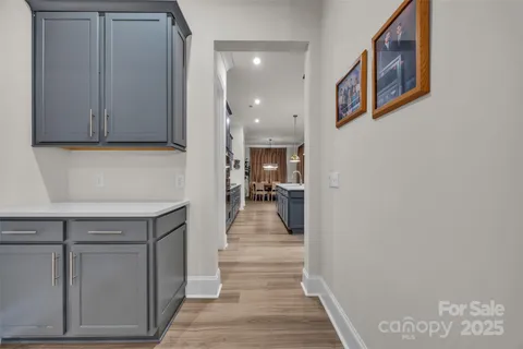 a view of a house with backyard and porch