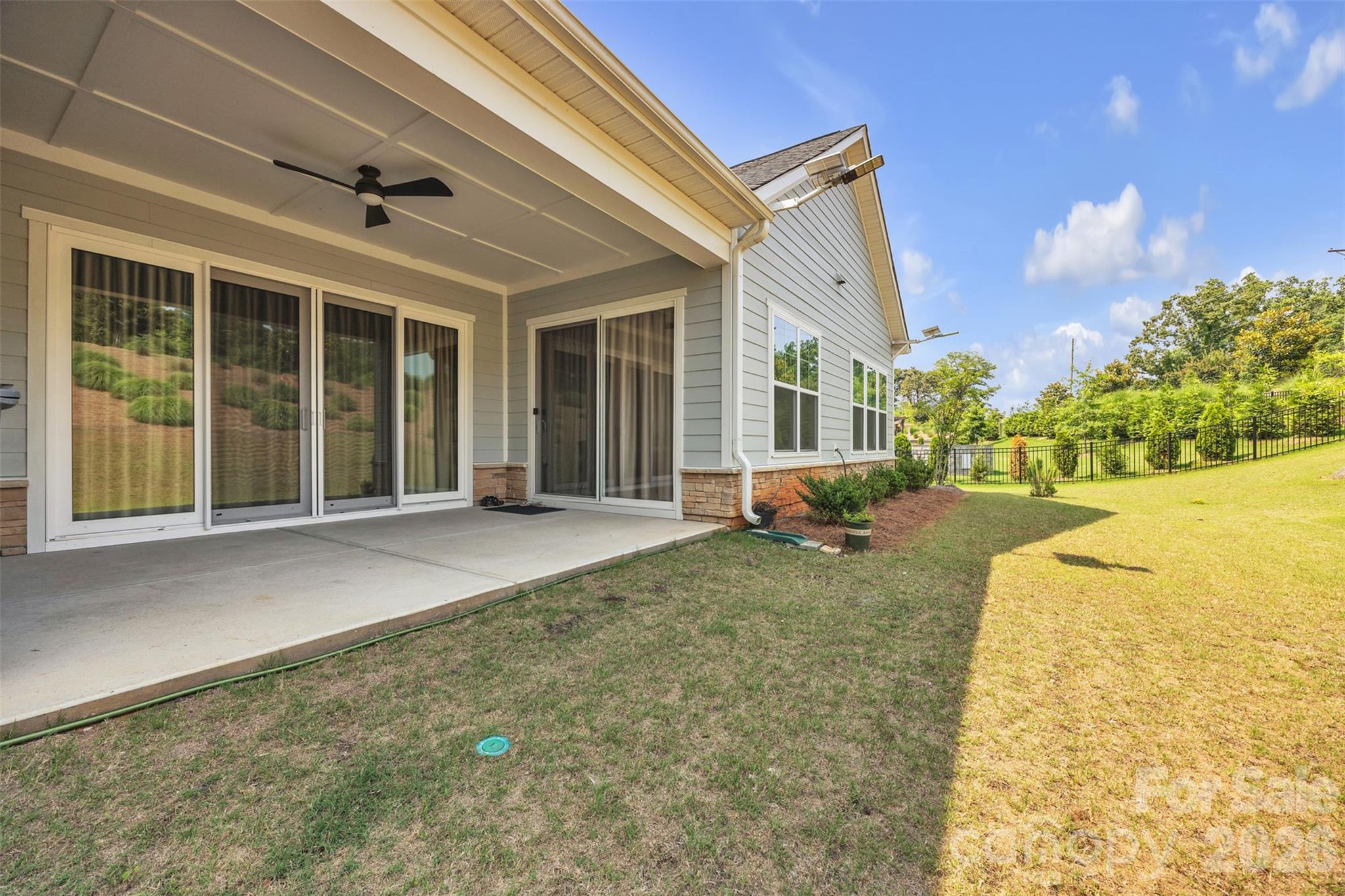 513 Meadow Ridge Drive Belmont, NC 28012 - Photo 36 of 40 a view of a house with backyard and porch