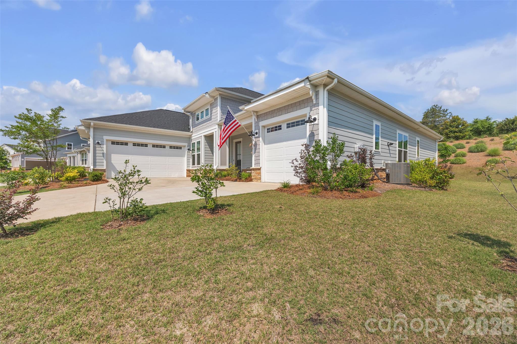 513 Meadow Ridge Drive Belmont, NC 28012 - Photo 4 of 40 a front view of a house with a yard
