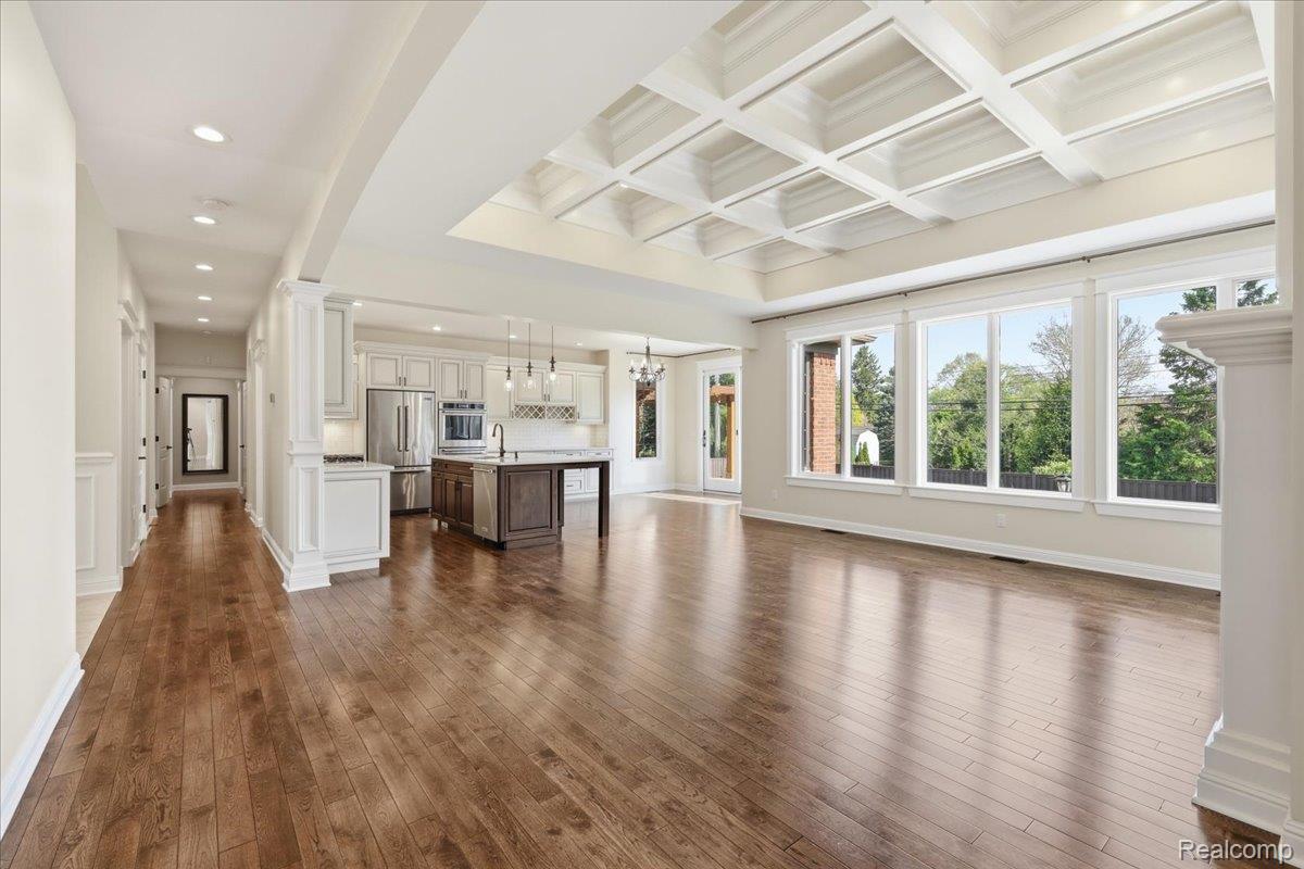 35339 West 13 Mile Road Farmington, MI 48331 - Photo 19 of 72 Great room featuring ornate columns, hardwood floors, recessed lighting, and coffered ceiling