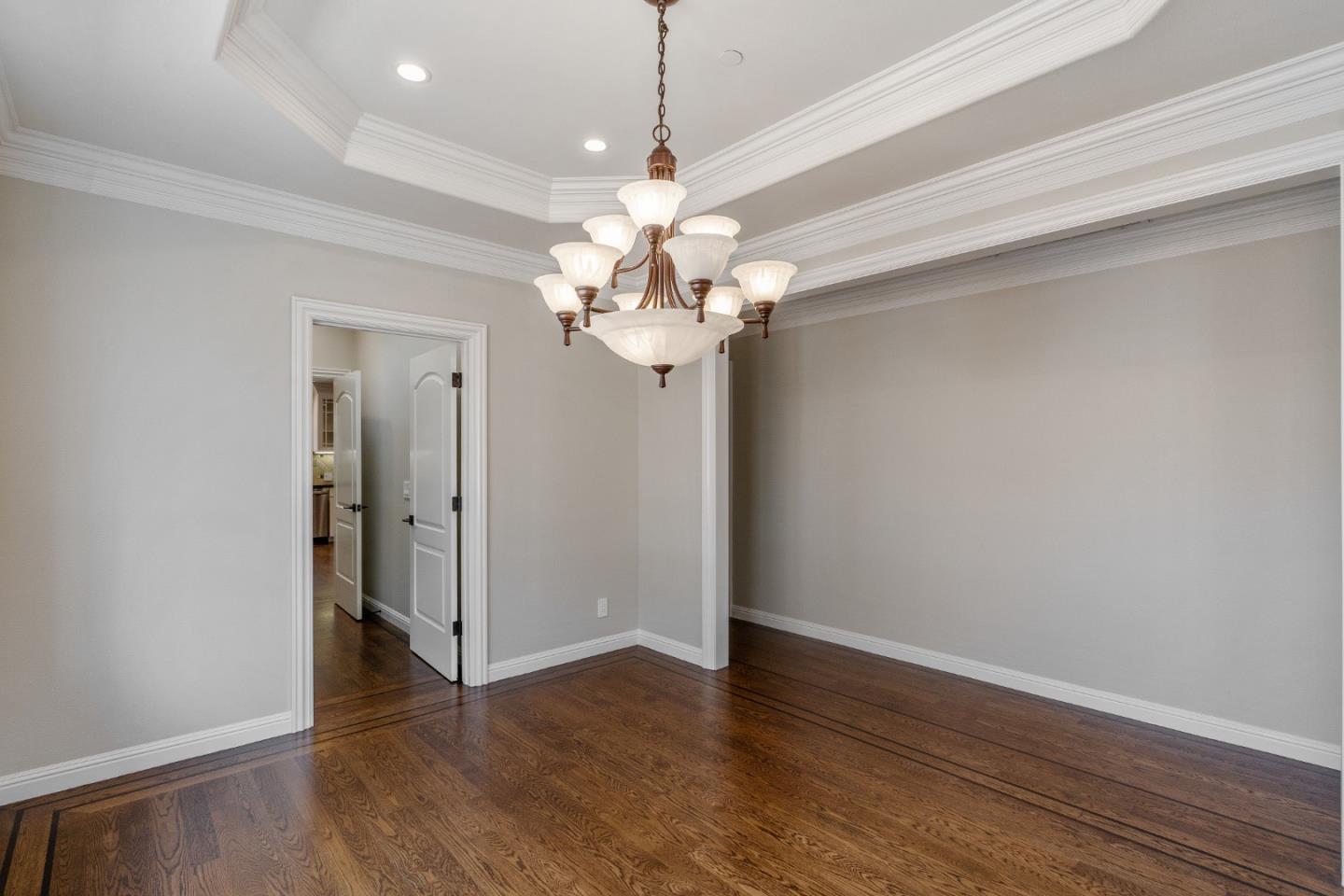 612 Prospect Row San Mateo, CA 94401 - Photo 11 of 54 a view of a chandelier in a room