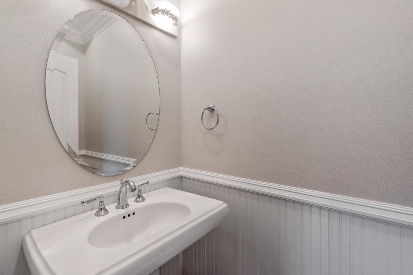 612 Prospect Row San Mateo, CA 94401 - Photo 24 of 54 a bathroom with a sink a vanity and a mirror