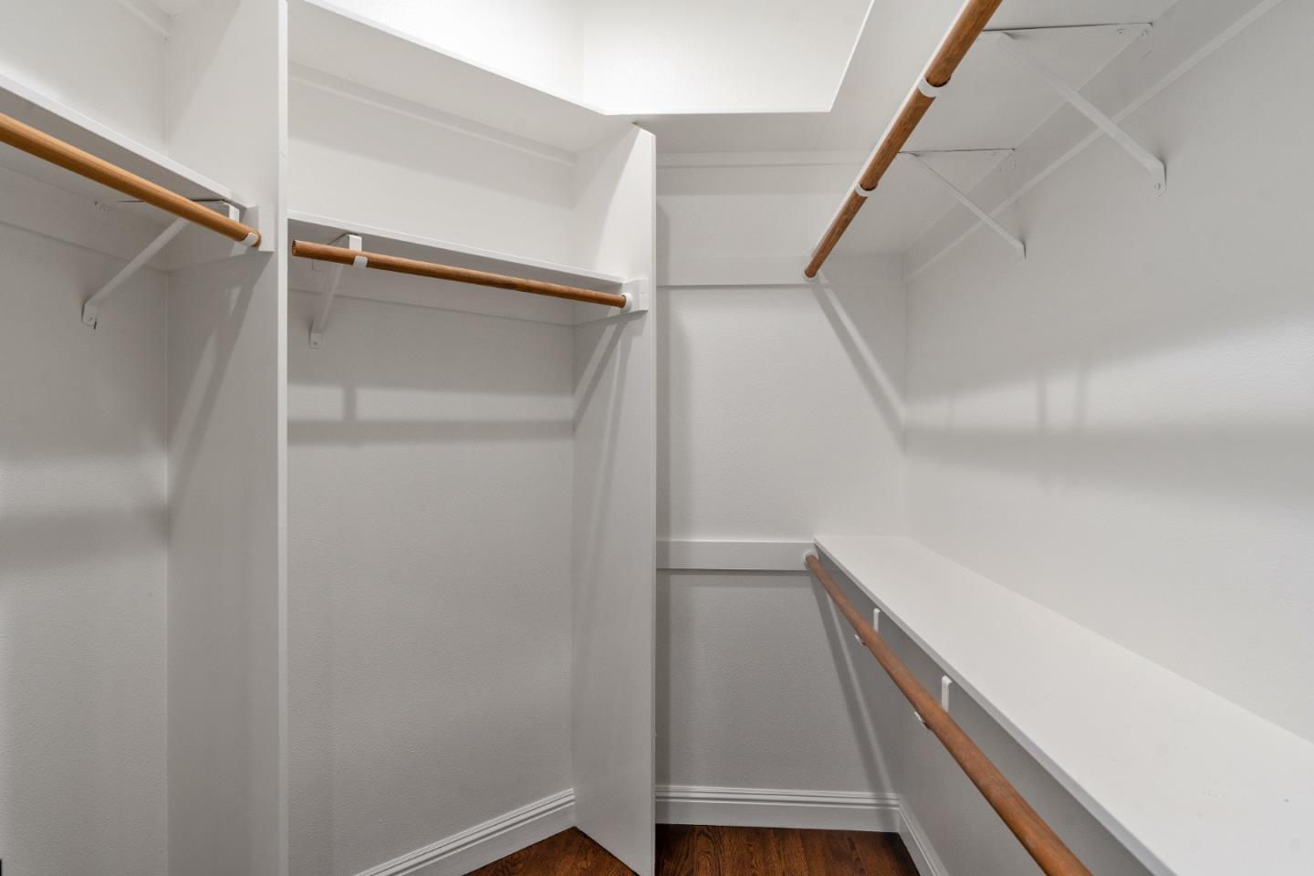 612 Prospect Row San Mateo, CA 94401 - Photo 26 of 54 a view of walk in closet with wooden floor