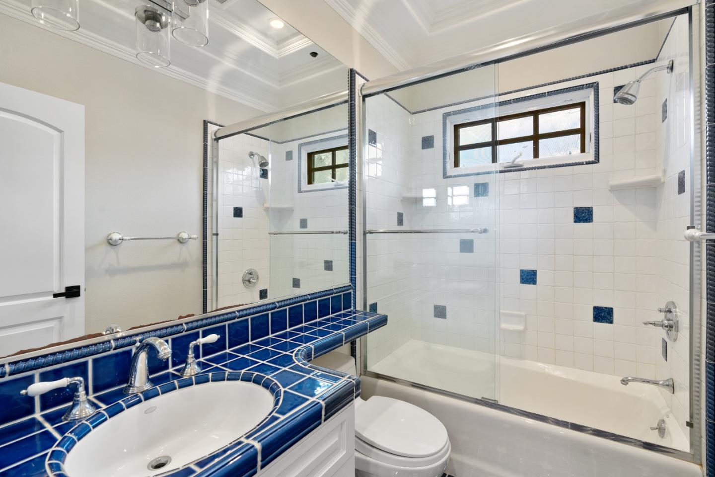 612 Prospect Row San Mateo, CA 94401 - Photo 35 of 54 a bathroom with a sink a toilet and shower