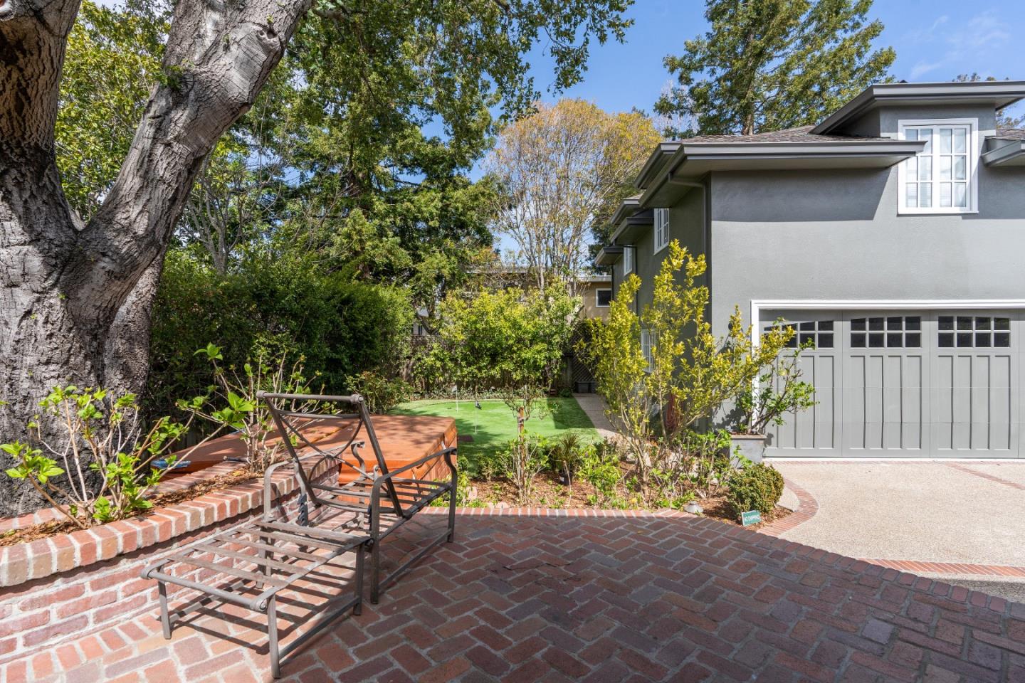 612 Prospect Row San Mateo, CA 94401 - Photo 45 of 54 a view of backyard with a table and chairs and potted plants