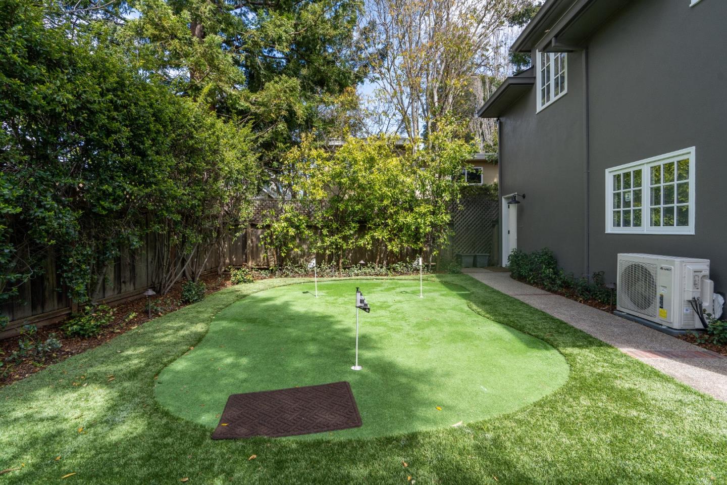 612 Prospect Row San Mateo, CA 94401 - Photo 50 of 54 a backyard of a house with table and chairs