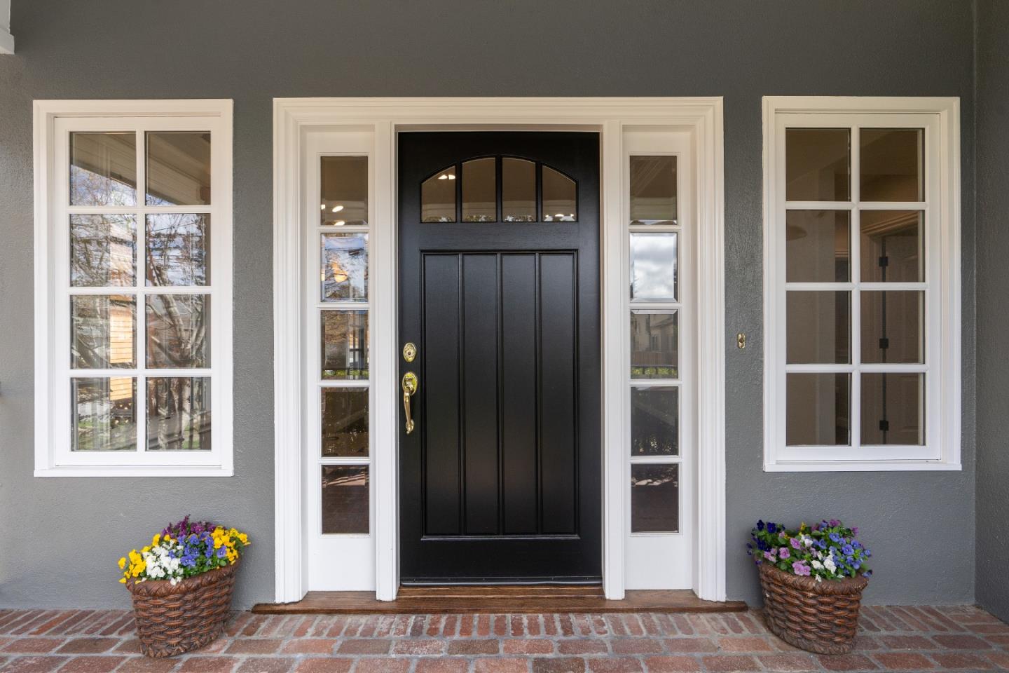 612 Prospect Row San Mateo, CA 94401 - Photo 5 of 54 a front view of a house with a potted plant