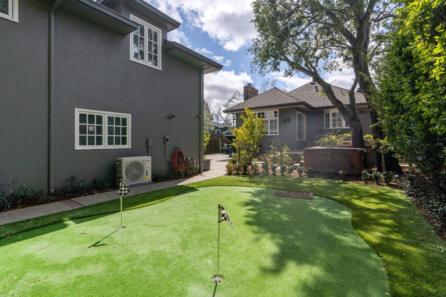 612 Prospect Row San Mateo, CA 94401 - Photo 51 of 54 a front view of house with yard and green space