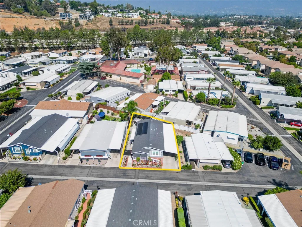 8651 Foothill, Unit 82 Rancho Cucamonga, CA 91730 - Photo 3 of 56 an aerial view of a residential houses with outdoor space