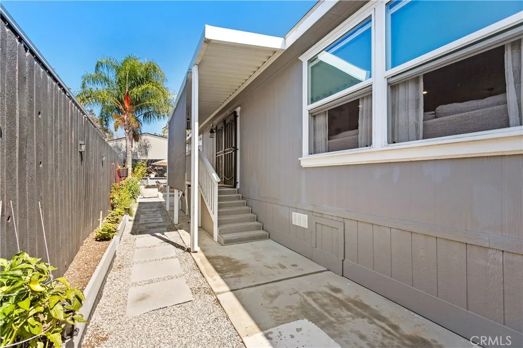 8651 Foothill, Unit 82 Rancho Cucamonga, CA 91730 - Photo 43 of 56 a view of a pathway of a house