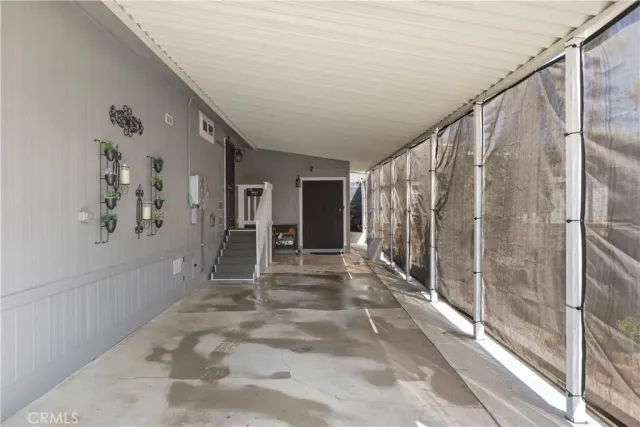 a view of entryway with flower pots