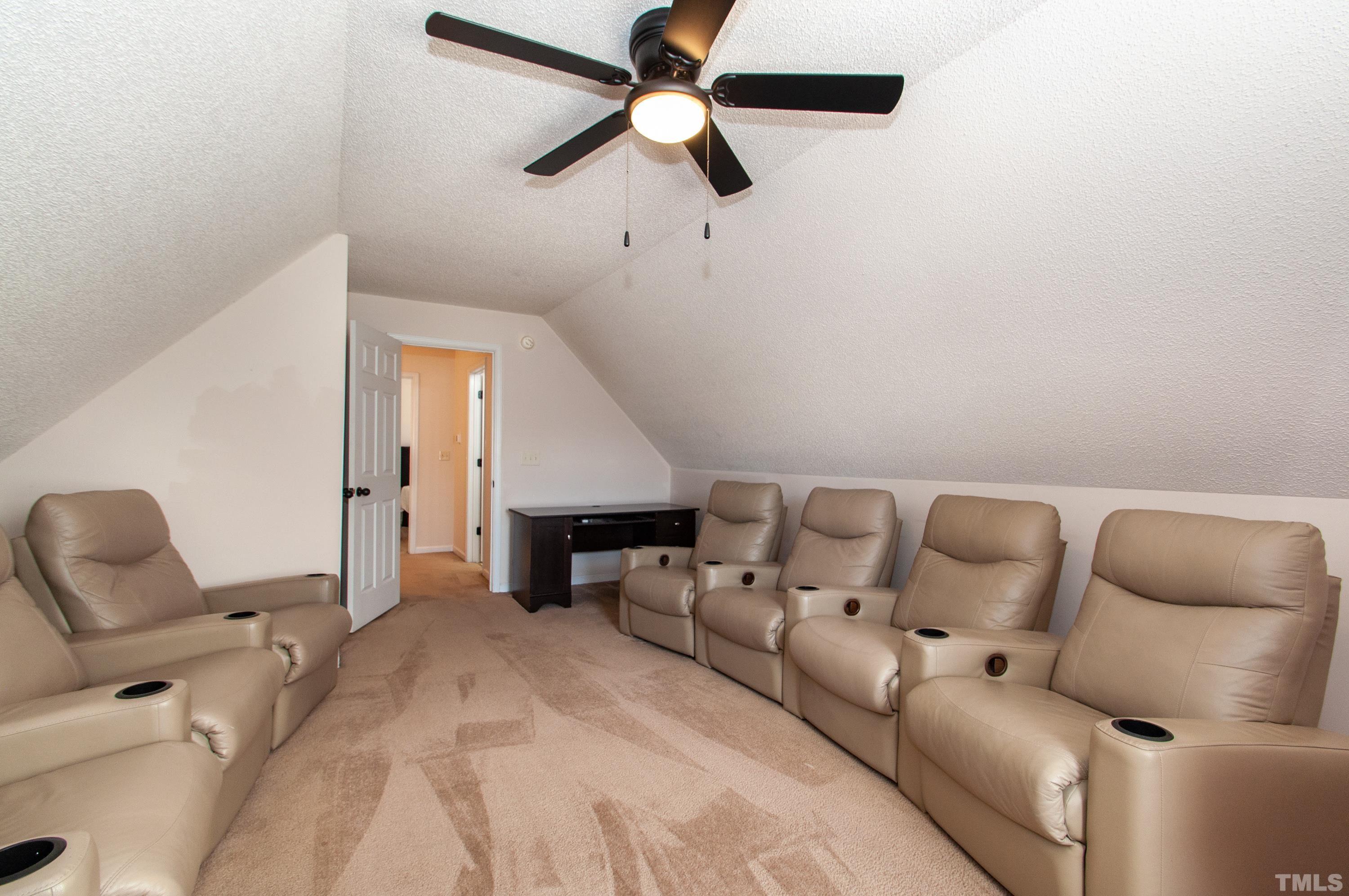 4617 Dresden Village Drive Raleigh, NC 27604 - Photo 24 of 33 a bed room with bed and ceiling fan