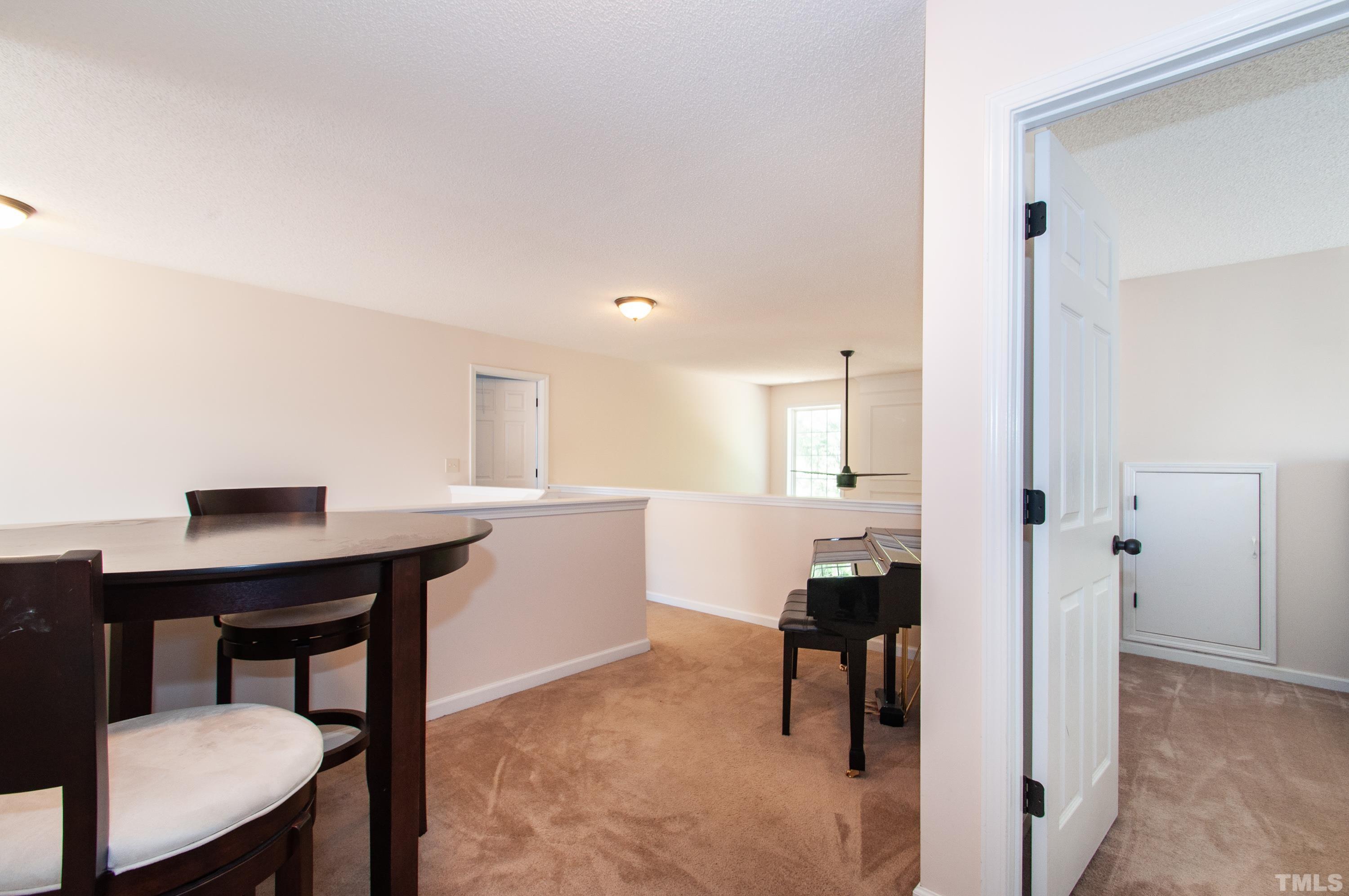 4617 Dresden Village Drive Raleigh, NC 27604 - Photo 27 of 33 a view of a workspace with furniture