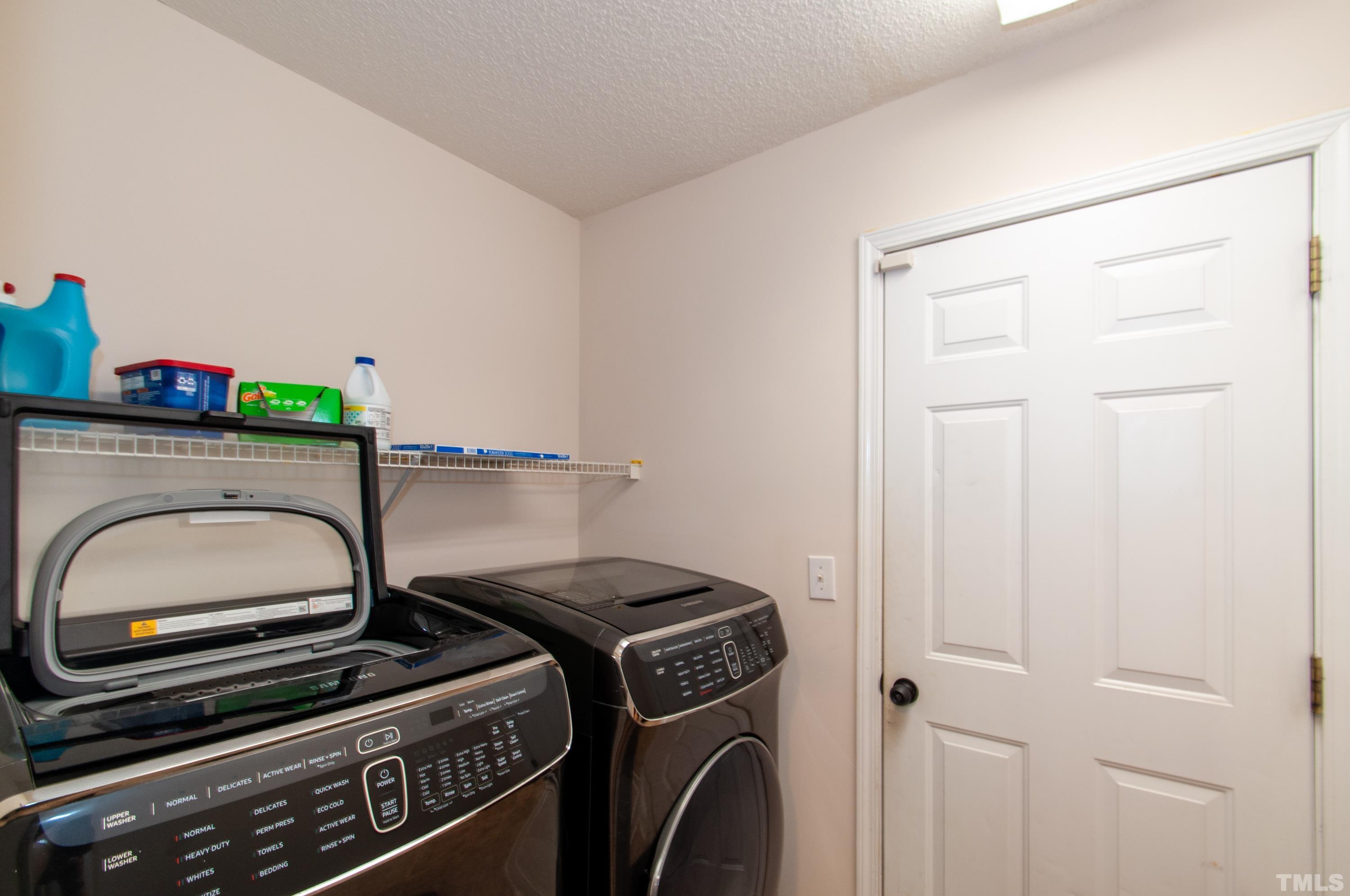 4617 Dresden Village Drive Raleigh, NC 27604 - Photo 29 of 33 a utility room with dryer and washer