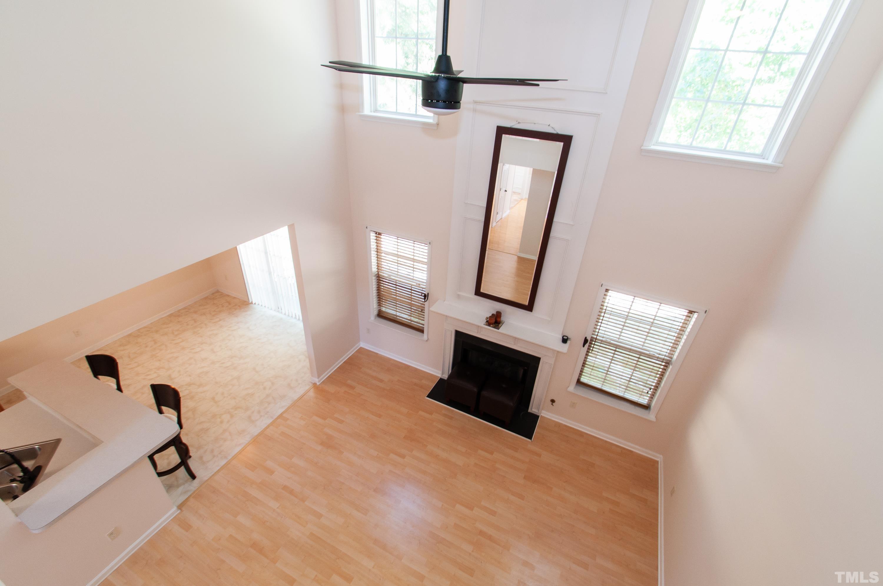 4617 Dresden Village Drive Raleigh, NC 27604 - Photo 6 of 33 a bedroom with a bed and a mirror