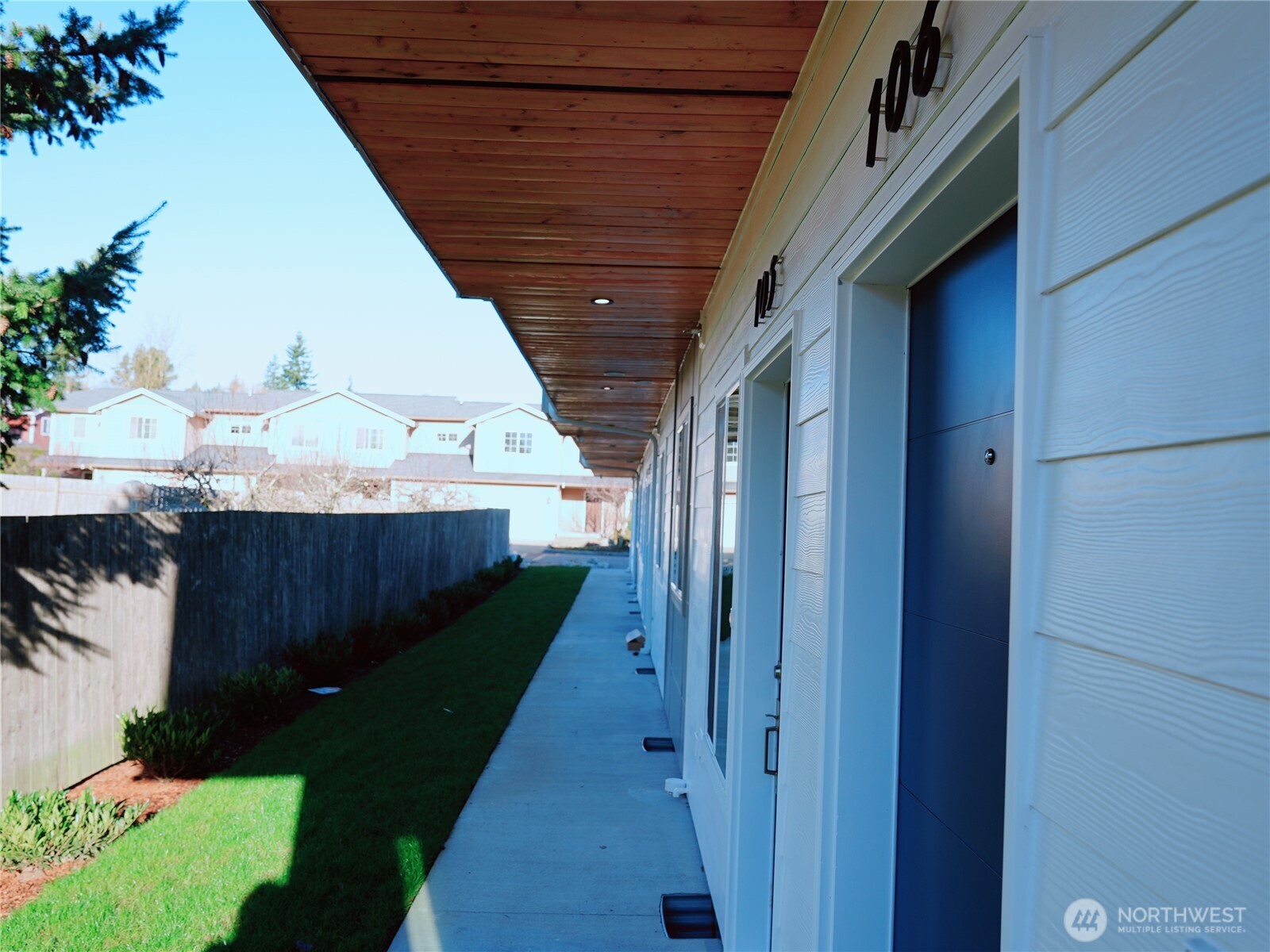 2155 Siddle Loop, Unit 106 Ferndale, WA 98248 - Photo 2 of 12 a view of a backyard