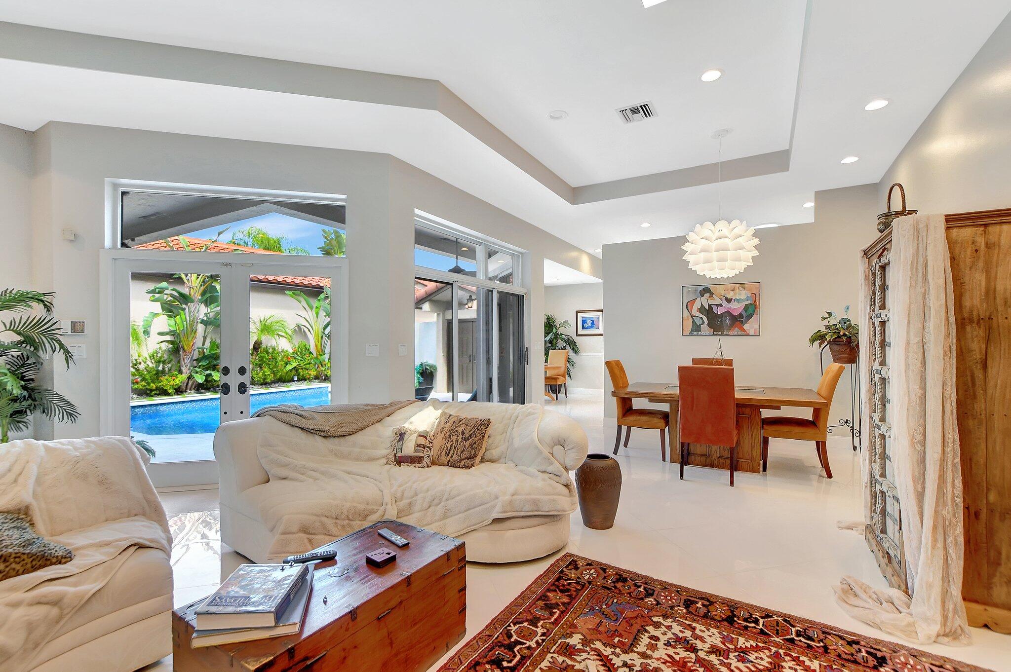 23164 Via Stel Boca Raton, FL 33433 - Photo 6 of 31 a living room with furniture and a large window