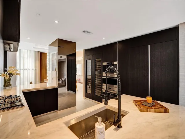 a lobby with furniture and window