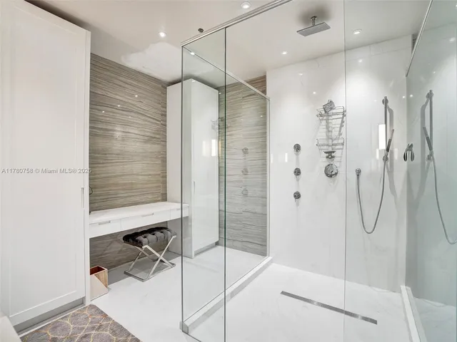 a bedroom with a bed and walk in closet