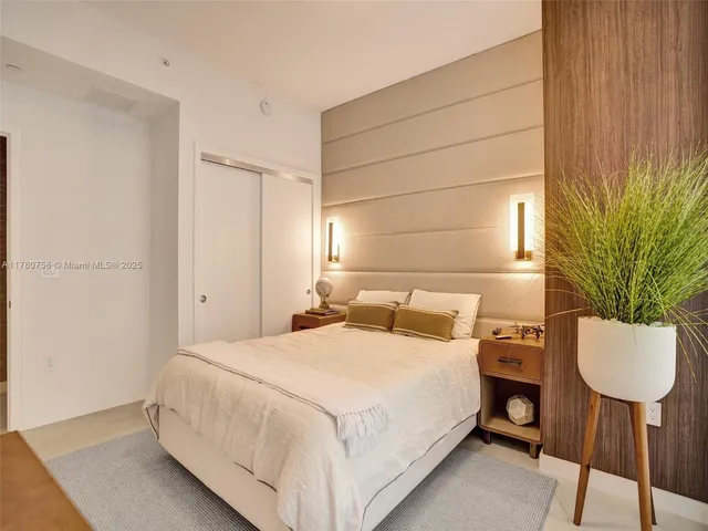 a bathroom with a shower and a toilet