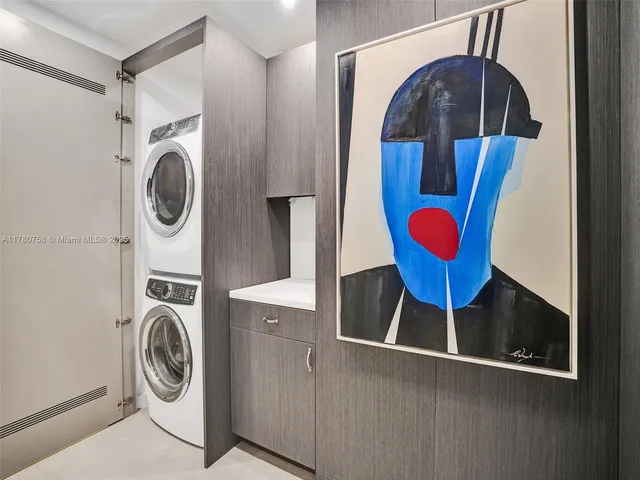 a lobby with furniture and a rug