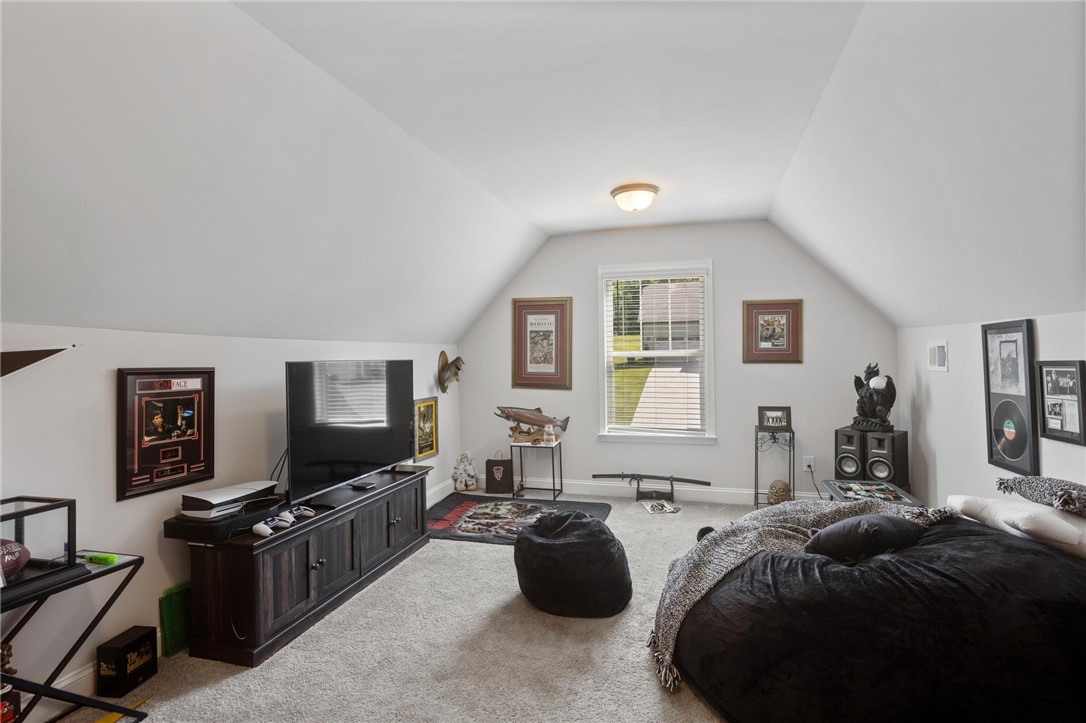 125 Estateside Drive Anderson, SC 29621 - Photo 30 of 37 A versatile bonus room offers ample space for recreation and relaxation with plush carpeting and natural light.