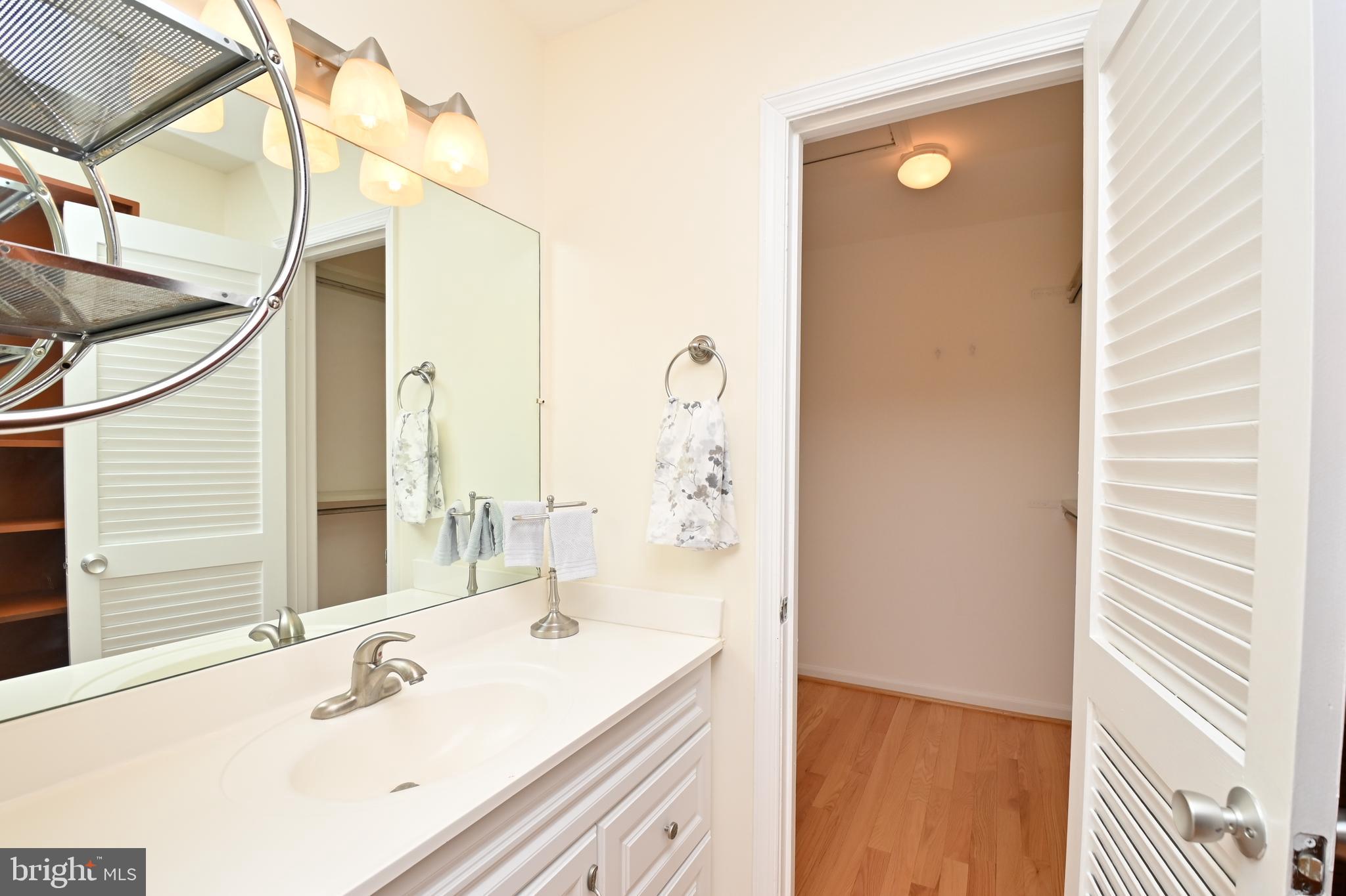 1012 Moorefield Creek Road Southwest Vienna, VA 22180 - Photo 18 of 35 Extra vanity w/ walk-in closet in primary bedroom