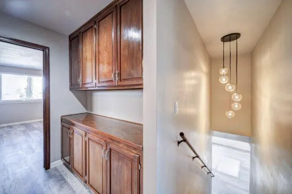 a kitchen with a sink and cabinets