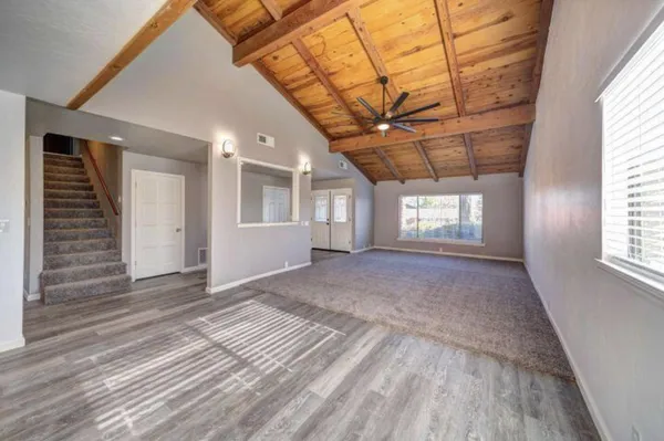 a view of an empty room with a window