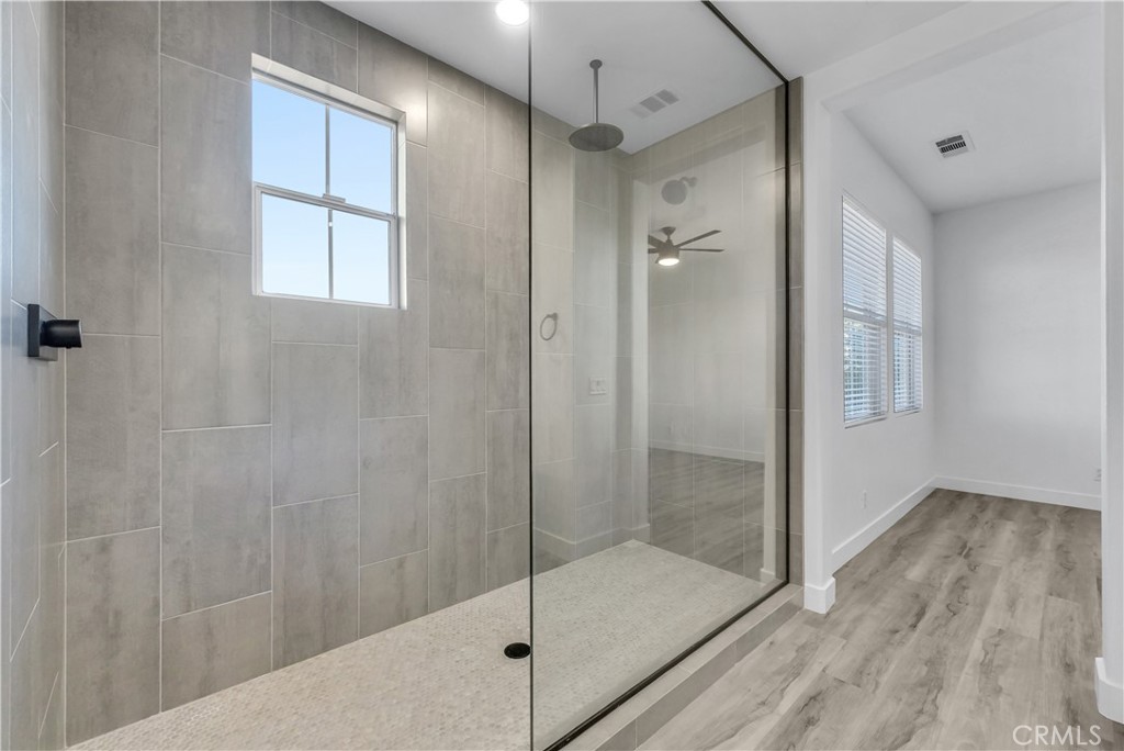 8415 Kendra Loop Orange, CA 92867 - Photo 25 of 36 a bathroom with a shower