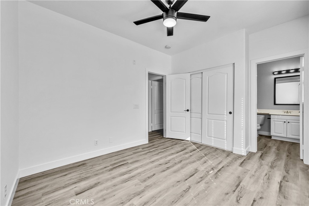 8415 Kendra Loop Orange, CA 92867 - Photo 30 of 36 a view of a livingroom with wooden floor