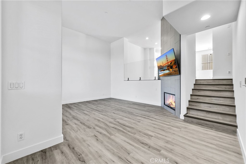 8415 Kendra Loop Orange, CA 92867 - Photo 4 of 36 a view of an entryway with wooden floor