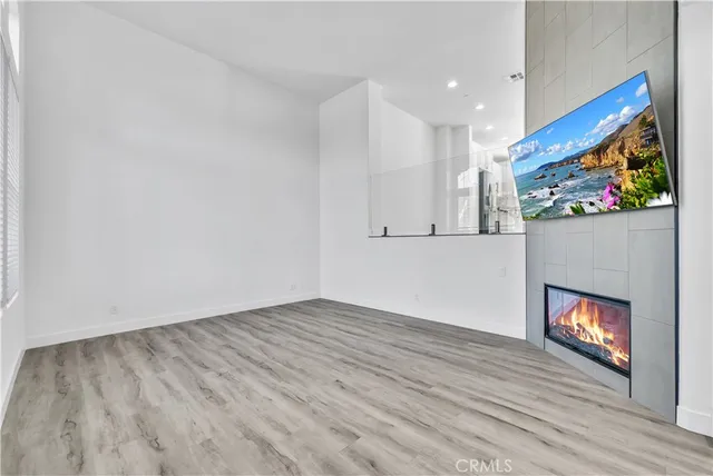 a view of kitchen with wooden floor