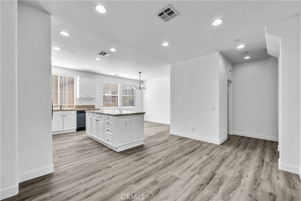 8415 Kendra Loop Orange, CA 92867 - Photo 9 of 36 a view of kitchen with wooden floor