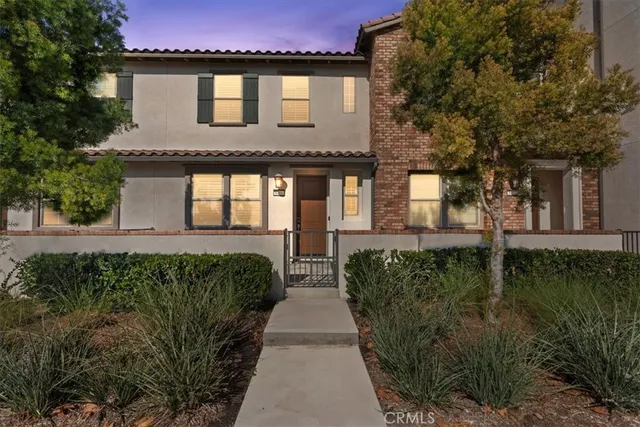 a black and white building with glass windows