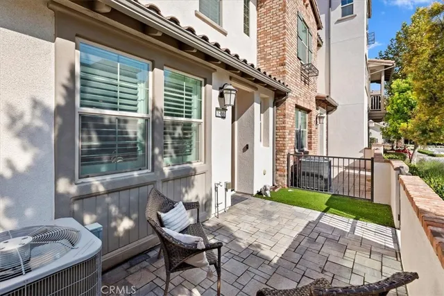 a view of balcony with furniture